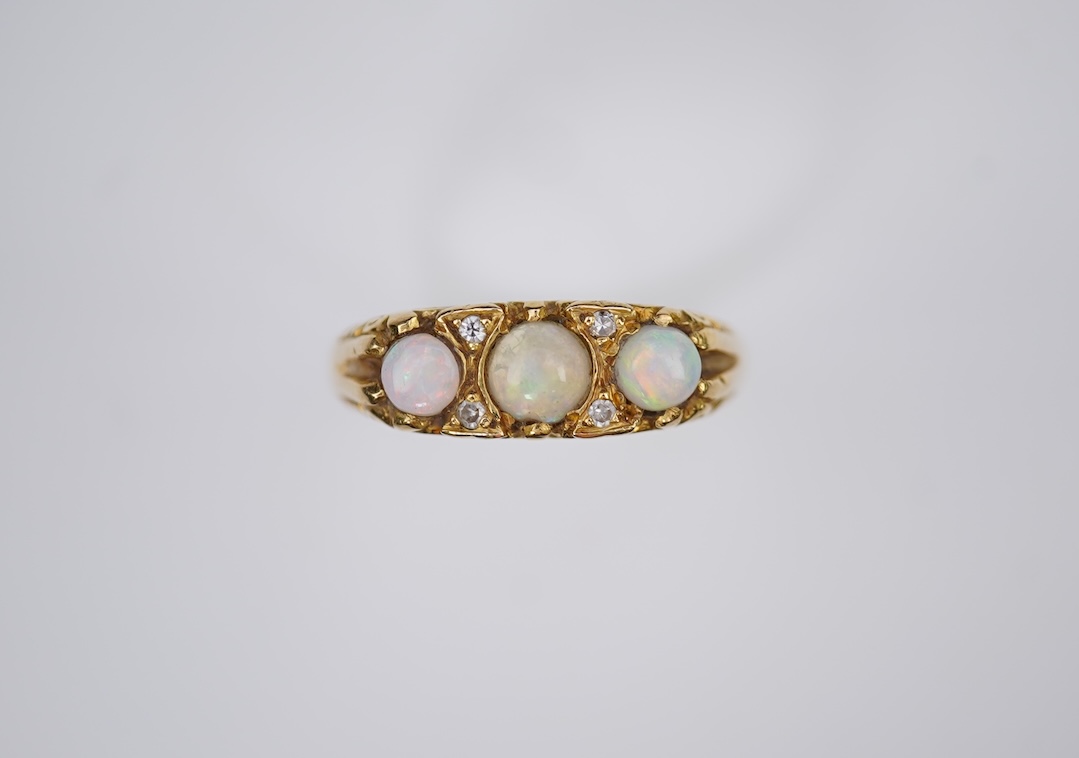 An opal and diamond ring, mid 20th century